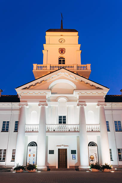 istock White Building Old City Hall In Minsk, Belarus. Night View 468943848