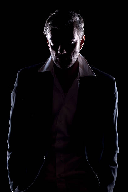 istock Man's silhouette in the dark 468946834