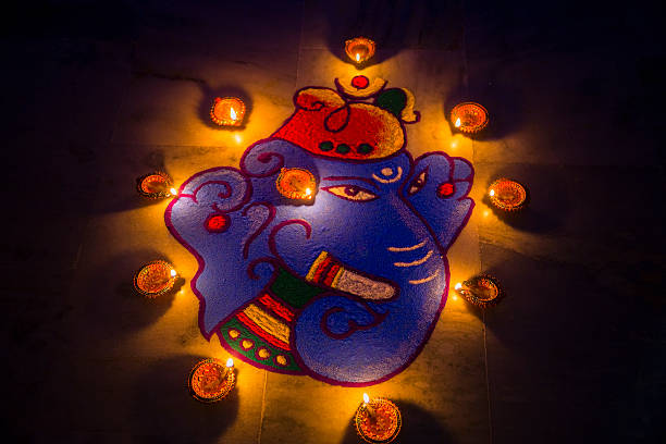 Rangoli Design adorned with Diya's on the ocassion of Diwali. stock photo