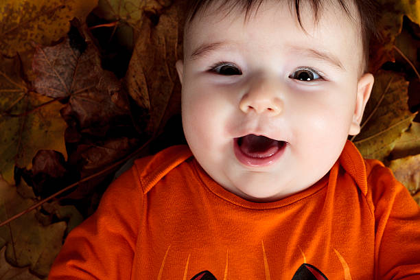 istock baby girl on leaf 468948134