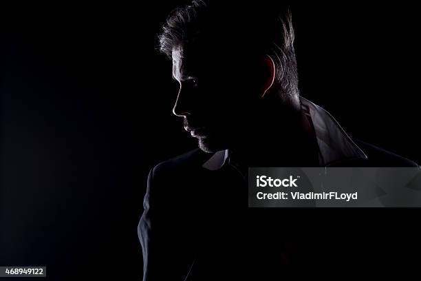 Mans Silhouette In The Dark Stock Photo - Download Image Now - Men, Profile View, Dark