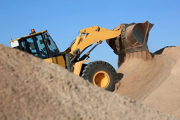 Bulldozer Working with Sand stock photo