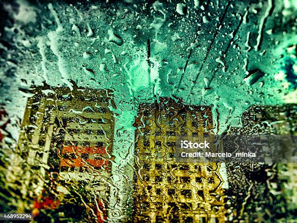 Raindrops On Windshield And Three Skyscrapers On Rain Stock Photo - Download Image Now