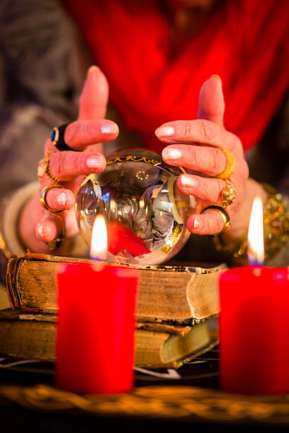istock Soothsayer during esoteric session with Crystal ball 468956189