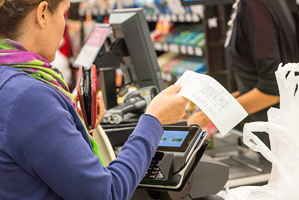 istock Caucasian woman electronic signing her bill 468956924