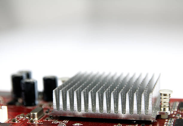 Radiator, silver and aluminum. On the motherboard with visible construction details.