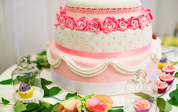 Wedding cake decorated with pink roses