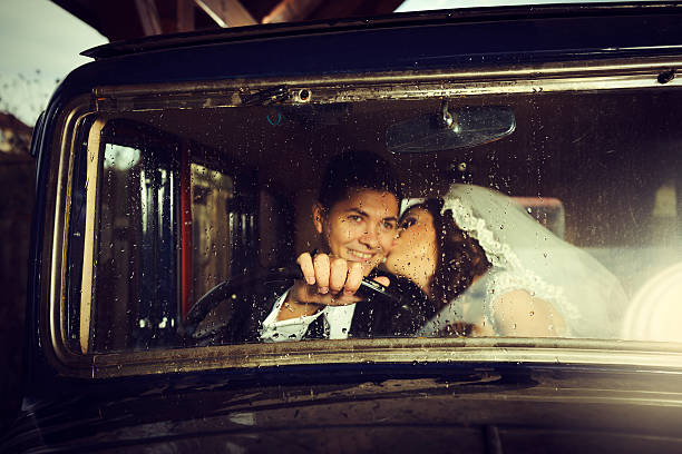 istock grooms in retro car 468961319