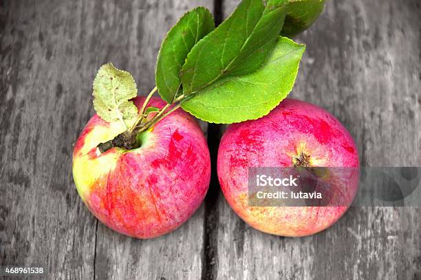 Apples On A Wooden Old Table Stock Photo - Download Image Now - Apple - Fruit, Plank - Timber, Red