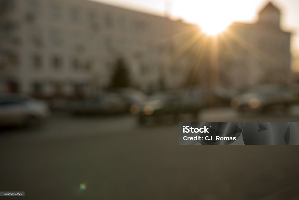 Traffic at sunset Traffic at sunset, defocused image of a road lit with warm light of setting sun 2015 Stock Photo