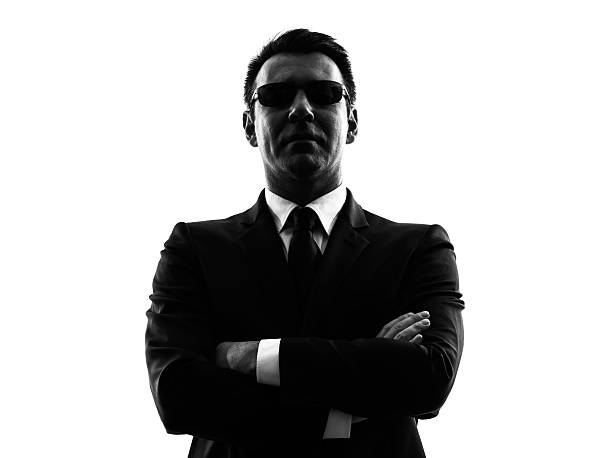 istock secret service security bodyguard agent man silhouette 468962439