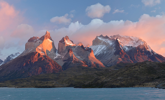 March, early morning view of the Chilean Andes at Torres del Paine National Park, Chile. This part of mountains is called Cuernos (horns) del Paine. Lake Pehoe in the foreground. The colors were absolutely magic and natural, the only filter I used was the polarizer, no photoshop color enhancing included!