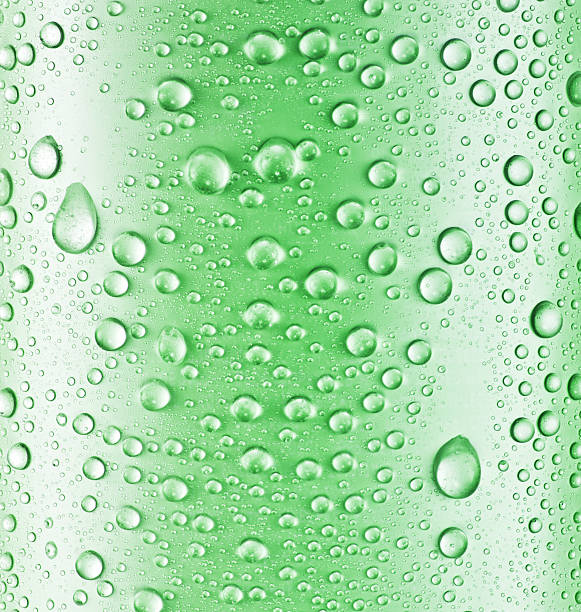 istock Water drops over green glass. 468967602