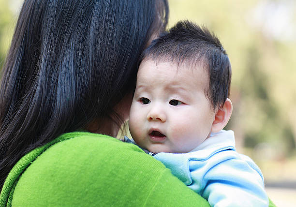 istock Happy Asian mother and son 468967918