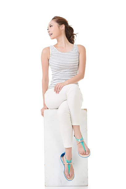istock Asian woman sit and pose 468970375