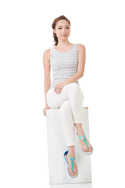 istock Asian woman sit and pose 468970619
