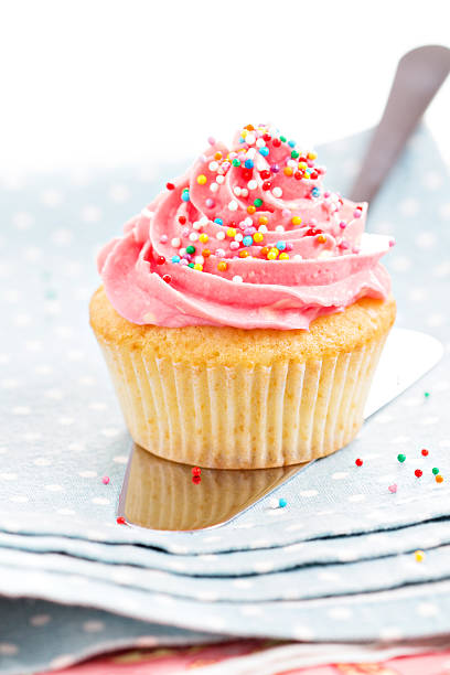 istock Cupcake with frosting and sprinkles 468971069