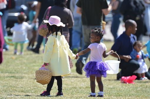 Denver, CO, USA - April 4, 2015: Children at an Easter Egg Hunt at the Potter's House. A helicopter dropped 25,000 eggs for the children to gather,