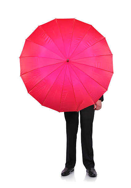 istock businessman with an open umbrella 468972413
