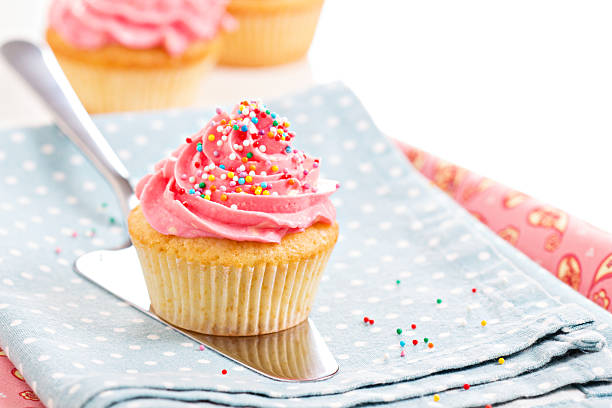 istock Cupcakes with frosting and sprinkles 468972645