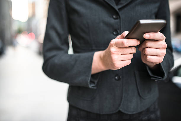 istock business woman text messaging 468976772