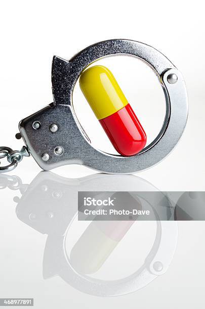 High Cost Of Illegal Drugs Stock Photo - Download Image Now - Capsule - Medicine, Crime, Danger