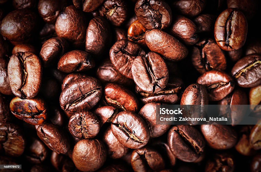 Roasted Coffee Beans background texture. Arabic roasting cofee Roasted Coffee Beans background texture. Arabic roasting coffee - ingredient of hot beverage. Brown coffee beans for background and texture 2015 Stock Photo