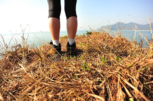 istock hiking feet seaside mountain peak 468980079