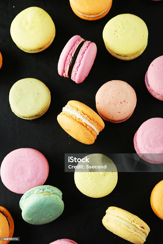 French colorful macarons on black background 2015 Stock Photo