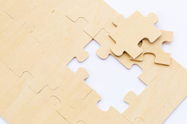 istock Wooden puzzle on white background 468980188
