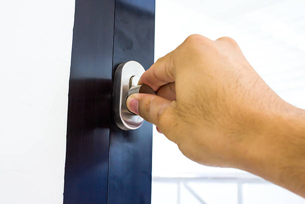 istock Man hand open door knob 468980469