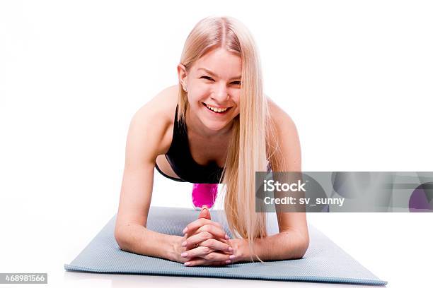 Fitness Woman Looking At Camera Isolated On White Background Stock Photo - Download Image Now