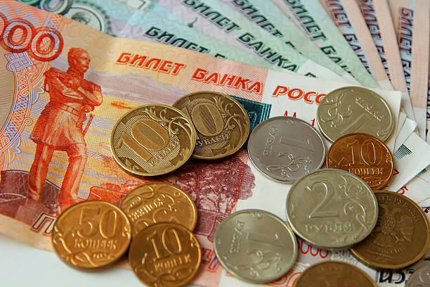 istock Russian rubles banknotes and coins iron. 468981788