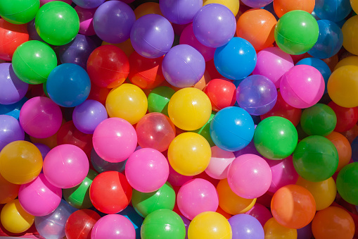 Some plastic balls, children's toy, background.