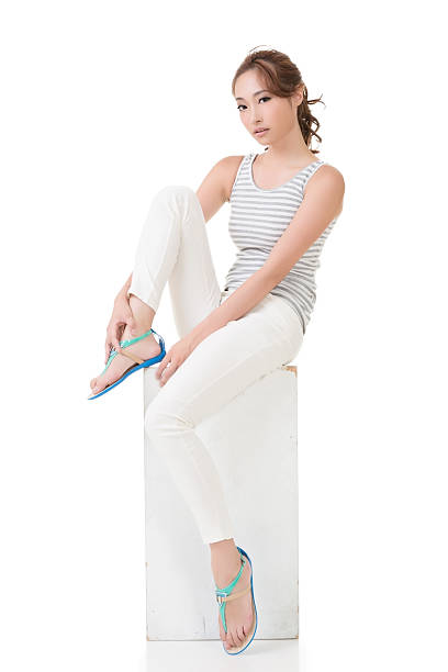 istock Asian woman sit and pose 468985163
