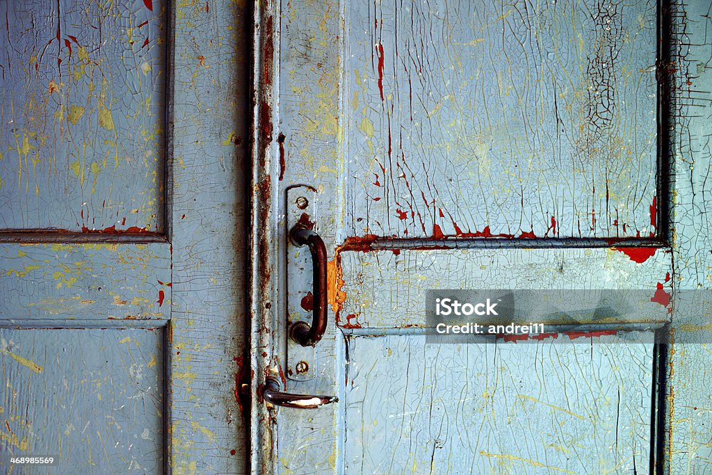 Old door on a blue cabinet Antique Stock Photo