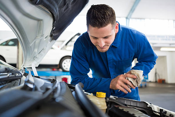 istock Mechanic working under the hood 468986604