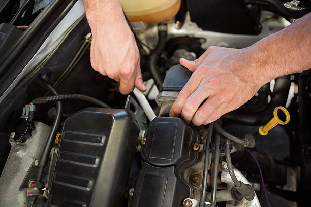 istock Mechanic working under the hood 468986610