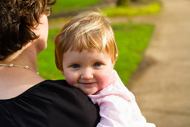 istock Daughter With Parent Walking 468987174
