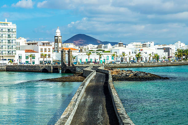 sea view of Castle of San Gabriel and Arrrecife sea view at Castle of San Gabriel and Arrrecife, Lanzarote, Canary Islands, Spain castle photos stock pictures, royalty-free photos & images
