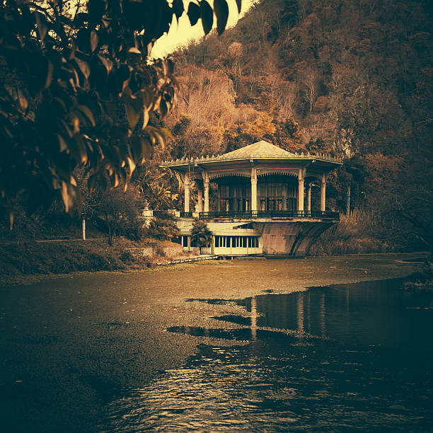 istock Old house near lake in a forest 468991093