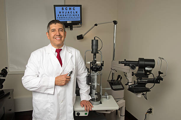 istock Hispanic Eye Doctor in Examination Room 468992294