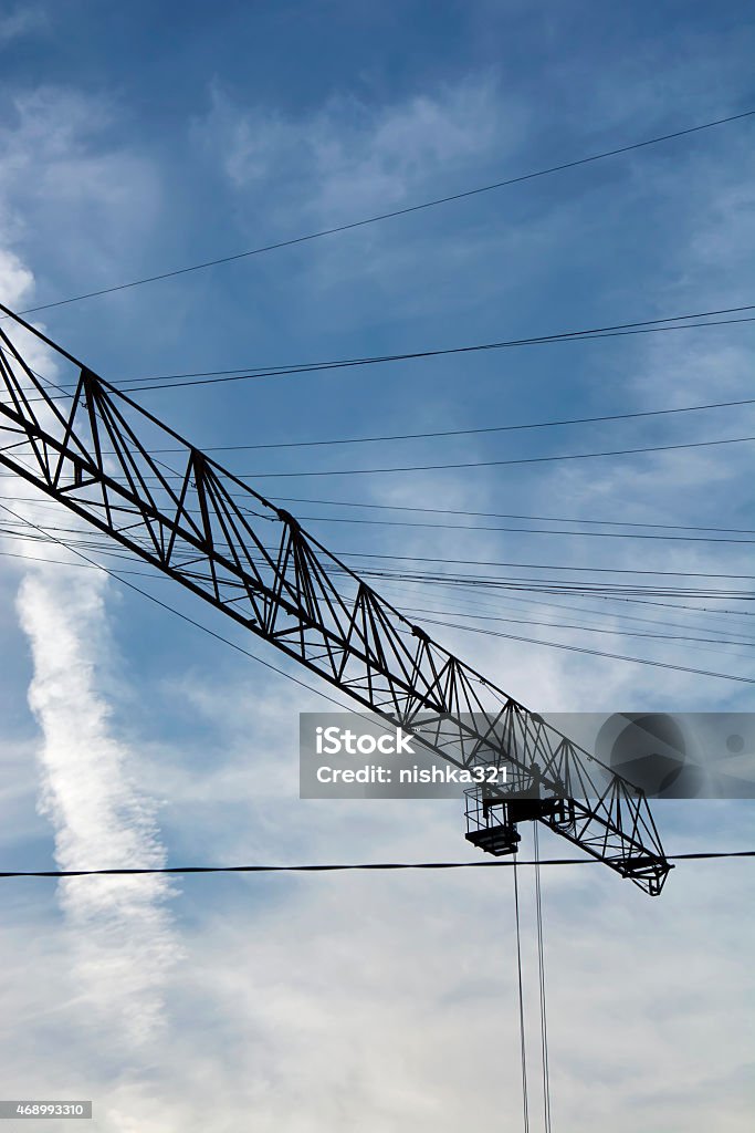 Crane sky Beautiful view of yellow big crane, blue sky 2015 Stock Photo