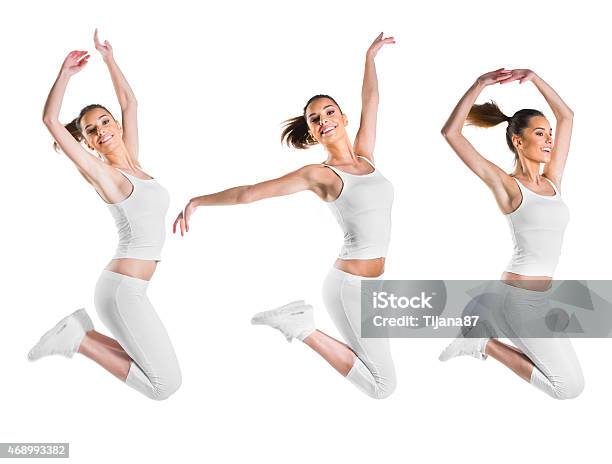 Fit Beautiful Young Woman Jumping Three Poses Stock Photo - Download Image Now - Cut Out, Healthy Lifestyle, Dancing