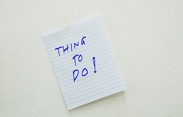 istock paper stick on the white wall 468994188