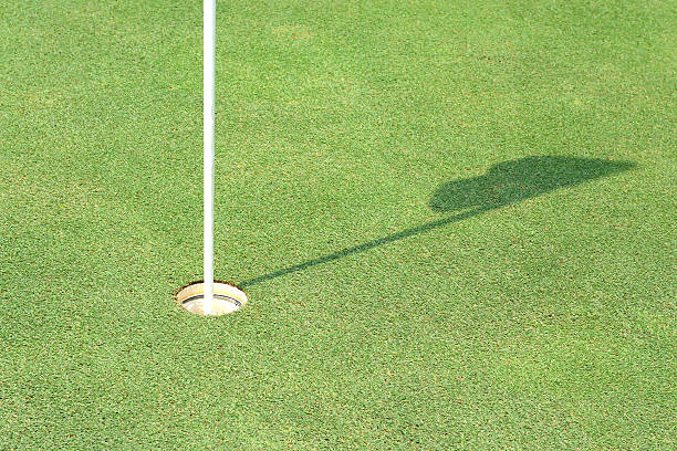 istock Shadow of golf flag 468994208