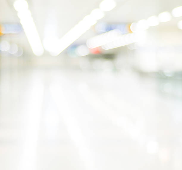 istock Blur inside office building with bokeh light background, busines 468994998