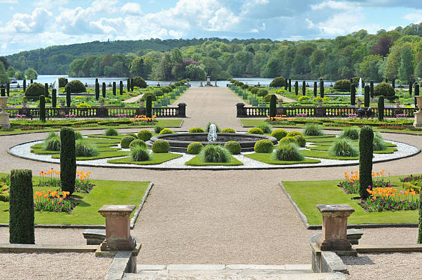 Springtime at Trentham gardens, Staffordshire,UK.. Trentham Gardens are formal Italianate gardens, part of an English landscape park in Trentham, Staffordshire. The site is located on the southern fringe of the city of Stoke-on-Trent, England. topiary stock pictures, royalty-free photos & images