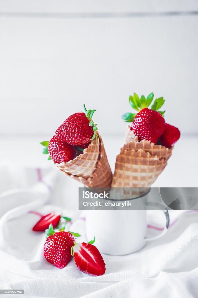 Strawberries in waffle cones Strawberries in waffle conesStrawberries in waffle cones 2015 Stock Photo