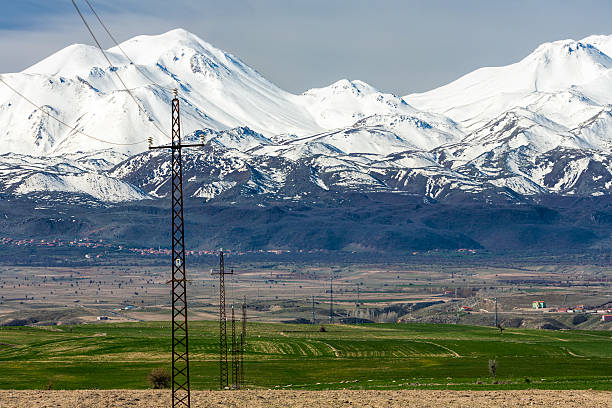 istock Electricity pylons and Mount Hasan 469000408